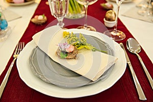 Festive Easter table setting with decorated eggs