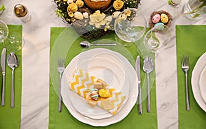 Festive Easter table setting with eggs