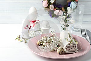 Festive Easter table setting with floral decor