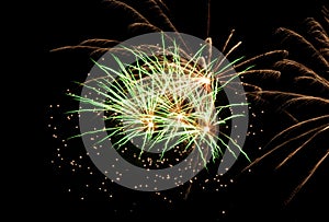 Festive fireworks against the night sky. Colorful and exciting fireworks in the new year and Christmas. Celebrate holidays. The be