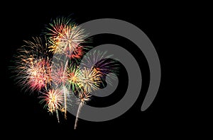 Festive fireworks display lit up over night sky