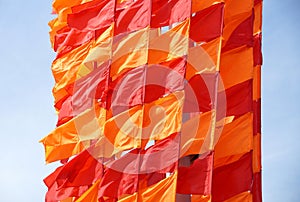 Festive flags of red and orange color