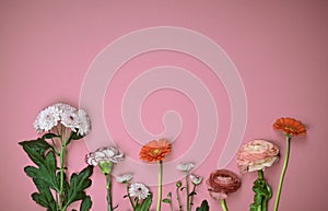 Festive flower arrangement on pink rose background