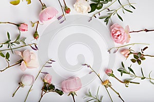 Festive flower composition on the white wooden background. Overhead view