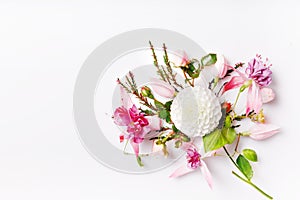 Festive flower composition on the white wooden background. Overhead view