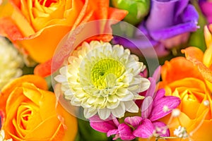 Festive flowers bouquet with chrysanthemum and orange