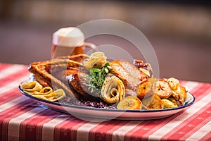 Festive garnished roast duck with apples and red cabbage