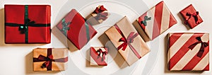 Festive gift boxes in wrapping paper for Christmas, top view