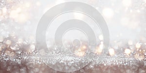 Festive glittering silver bokeh background