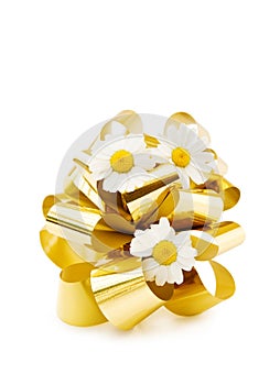 Festive golden bow and pretty flowers