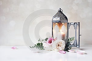 Festive greeting card, invitation for Muslim holiday Ramadan Kareem.Vintage Moroccan lantern with glowing candle, green