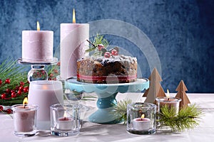 Festive holiday table with English style Christmas fruit cake