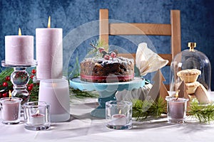 Festive holiday table with English style Christmas fruit cake