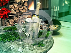 Festive home decoration with champagne and fireplace