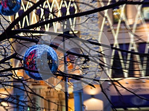 Festive illuminations in the streets of the city, Abstract background of christmas lights, Christmas decorations