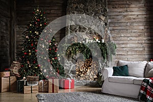 Festive interior with Christmas tree and fireplace