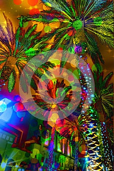 Festive lights abstract palm trees