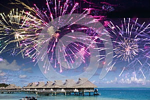 Festive New Years fireworks over the tropical island, mixed media
