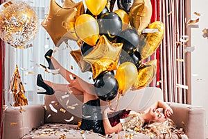 Festive occasion amused blonde girl balloons