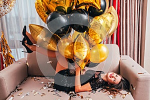 Festive occasion happy brunette girl balloons