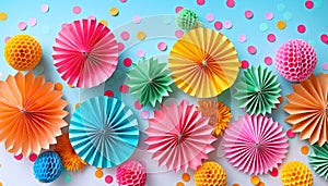 Festive Paper Decorations Array variety of shapes, colors and textures on a light background