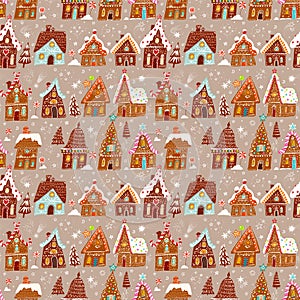 Festive pattern with decorated gingerbread houses, intermingled with Christmas trees, sweets and snowflakes on beige