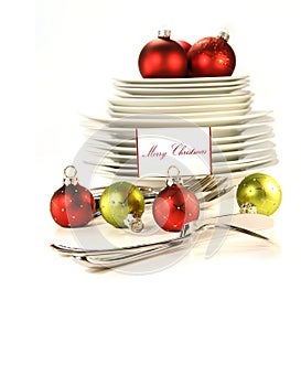 Festive place card holders with plates and cutlery