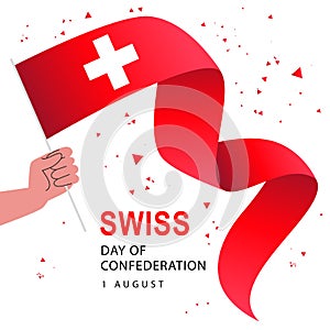 Festive red ribbon of the Swiss flag in the hand of a man. 1 August. Confederation Day in Switzerland. Federal holiday