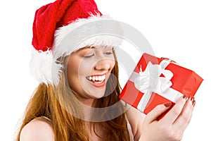 Festive redhead holding a gift