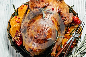 Festive roast duck with orange, rosemary and berry. festive christmas recipe. Top view