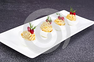 Festive snack stuffed eggs