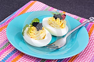 Festive snack stuffed eggs