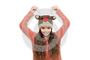 Festive spirit. Cheerful kid. Playful cutie. Why children seems cute. Adorable baby wear cute winter knitted hat. Cute