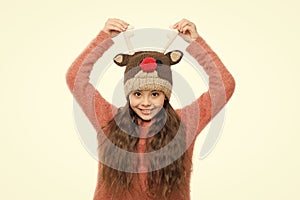 Festive spirit. Cheerful kid. Playful cutie. Why children seems cute. Adorable baby wear cute winter knitted hat. Cute