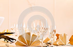 Festive table arrangement with glasses and served and cutlery