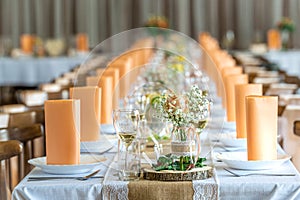 festive table decoration for an banquet party in orange