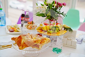 Festive table with fruits and snacks. Catering.