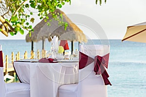 Festive table in the gazebo at sunset caribbean dominican