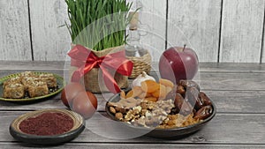 Festive table in honor of Navruz. Wheat with a red ribbon, the traditional holiday of the vernal equinox Nawruz