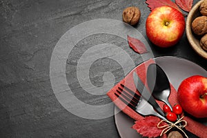 Festive table setting on black background, flat lay with space for text. Thanksgiving Day celebration