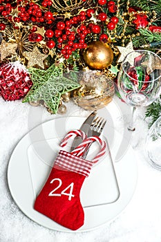 Festive table setting with christmas tree decoration