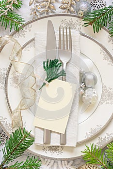 Festive table setting of with fir tree branches and Christmas decorations. Card mockup