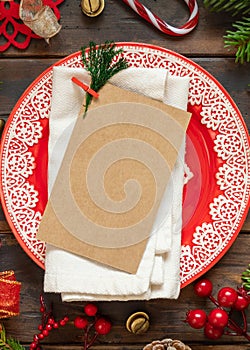 Festive table setting of with fir tree branches and Christmas decorations. Greeting card mockup