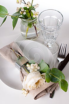 Festive table setting with floral decoration