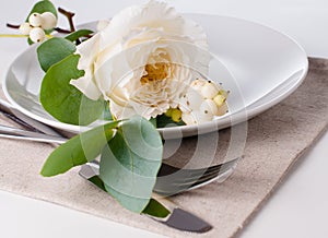 Festive table setting with floral decoration