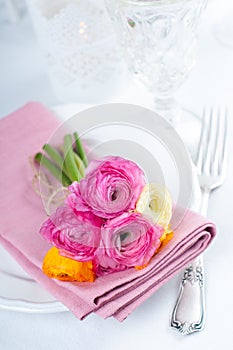 Festive table setting with flowers