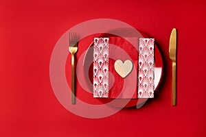 Festive table setting valentine`s day red background