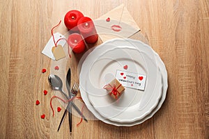 Festive table setting for Valentines Day celebration on wooden table