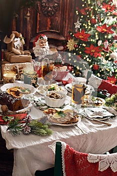 Festive table with traditional Christmas Eve dishes