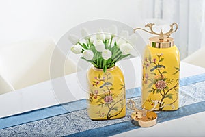 festive table tulip bouquet in vase dining room